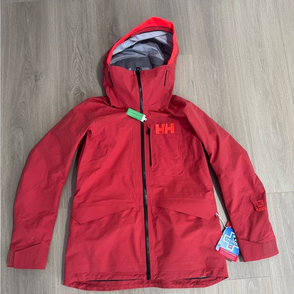 BRAND NEW Helly Hansen coat (W Aurora Infinity Shell Jacket). Women’s Large